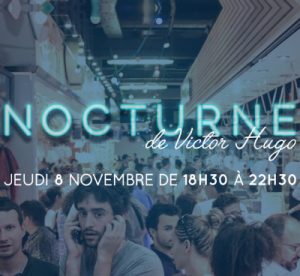 Crowded indoor market scene with people walking under bright lights. Overlaid text reads: "NOCTURNE de Victor Hugo - Jeudi 8 Novembre de 18h30 à 22h30." Perfect for those seeking lively November events.