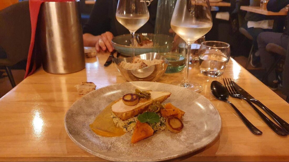 Delicious meal with wine glasses