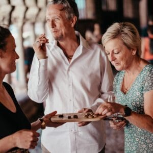 A group of people standing next to each other during a Gourmet Food Tour in Albi.