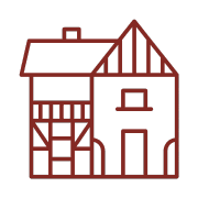 A simple red line drawing of a house with a pitched roof, front door, and windows, featuring architectural details that suggest a traditional or historic design—perfect for representing an Albi Gourmet Food experience.